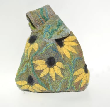 Handmade felted wool handbag featuring yellow flowers and green leaf patterns on a green background.