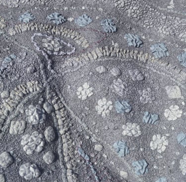 Close-up of a textured nuno felted lamination technigue