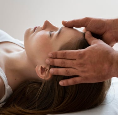 woman receiving craniosacral therapy