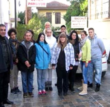 The cook and waiter trainees with Tarik Bitlis, the director of IBETH