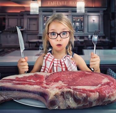 Young girl starting lunch