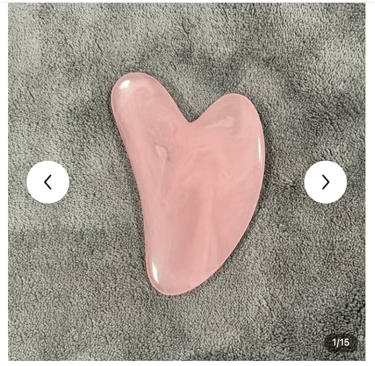 a pink heart shaped object on a carpet