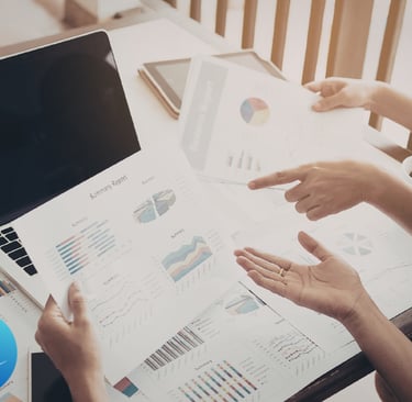 Getting website traffic but no leads while reviewing analytics on a laptop