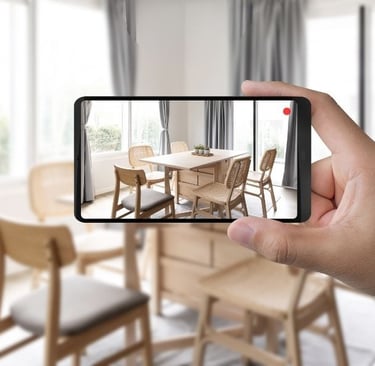 Leasing agent filming a video tour of a modern apartment to market units online.