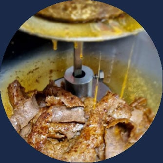 Proper juicy Doner dripping in greasy fat