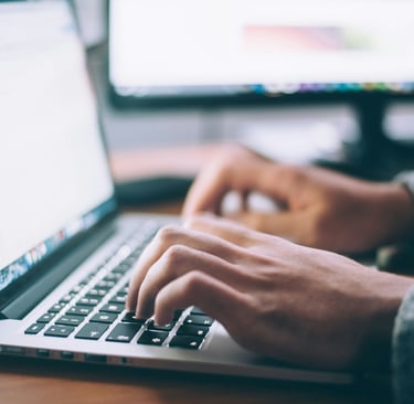 typing on a laptop
