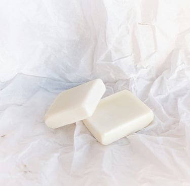 bars of natural soap on a parchment