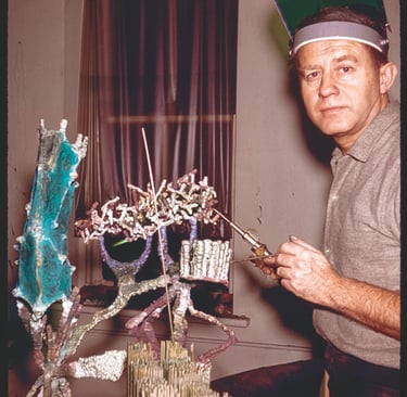 Sculptor Ibram Lassaw in 1962, working on Sui Shi, a metal sculpture.