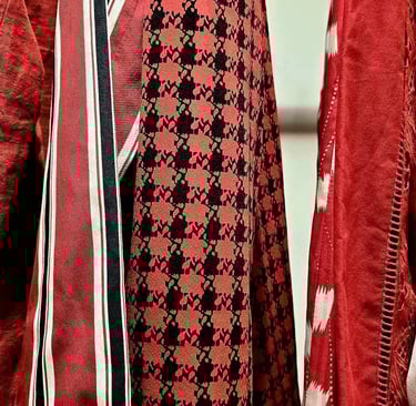 a bunch of different red coloured pieces of clothing