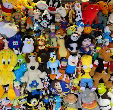 Plush toys neatly ordered next to each other