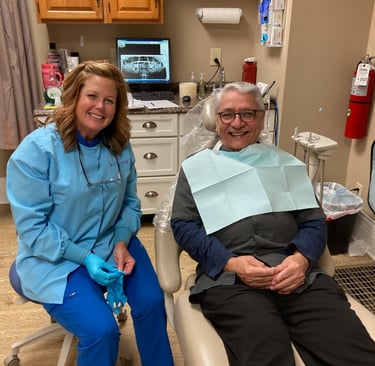 A patient receiving dental care at the center for hope and healing
