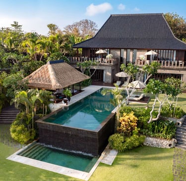 Bvlgari resort house with a pool and a gazeboar