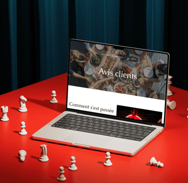 a laptop computer sitting on a table with chess pieces