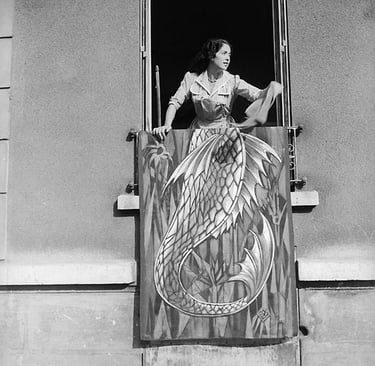 Woman airing a rug with fish motif