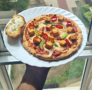 personal paneer pizza and garlic bread