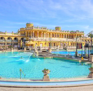 a large pool with a fountain and a fountain