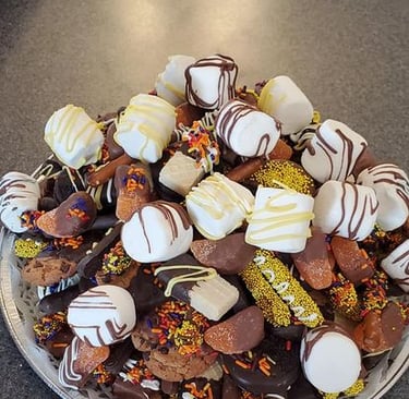 a plate of chocolate covered chocolate covered cookies