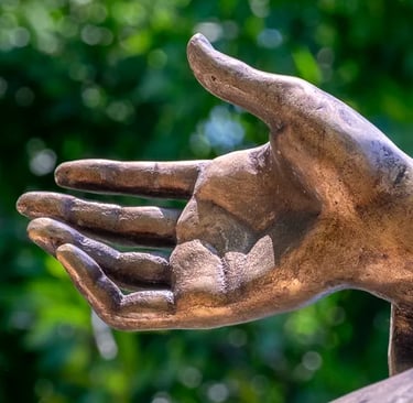 Close up on the hand of Saint Barbara - gesture of devotion.