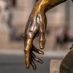 Close up on the hand of the Attila Jozsef statue.