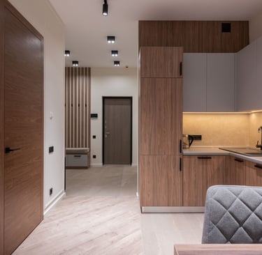 a kitchen with a chair and a chair