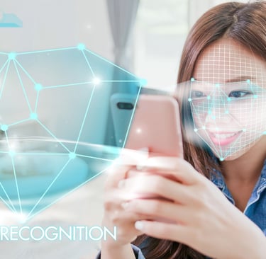 image of girl with smartphone using Facial Recognition app