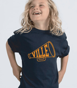 Girl wearing a custom cheer shirt