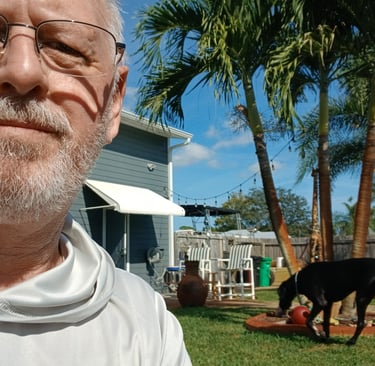Robert at a dog check-in watching a large dog