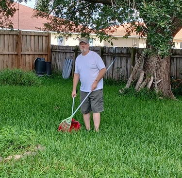 Robert Removing pet waste from yard