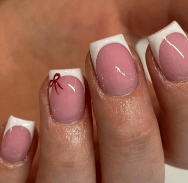 Set of short square French press-on nails with white bow design, chic nail art for winter streetwear