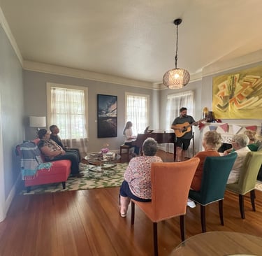 Tabitha at butterfly effect consulting leading worship at a Mindfulness Retreat