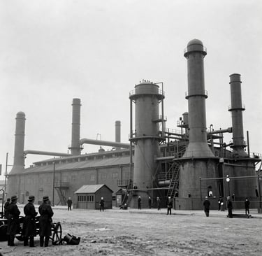 a table with a glass and a glass on it with a wood wall behind it