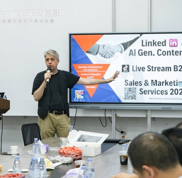 a man standing in front of a large screen