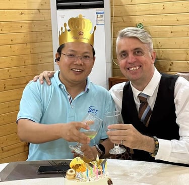 a man and woman are sitting at a table