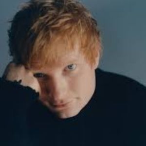 a man with a black shirt and a black shirt