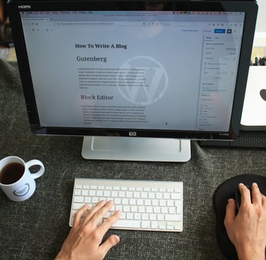 A restuarant owner writing a blog pot for their website.