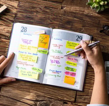 A woman checking her daily planner
