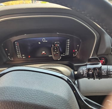 Interior of 2024 Honda Pilot with a programmed key by locksmith on the dashboard in Arden, NC