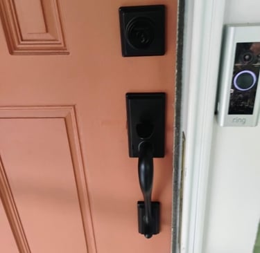 Orange front door representing emergency home lockout service in Spruce Pine, NC