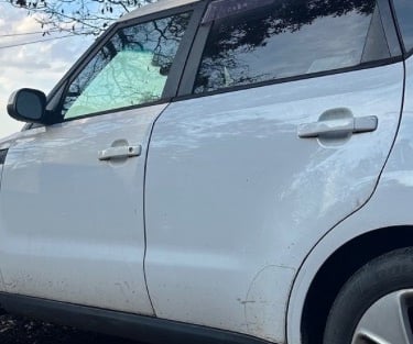 White Kia in Weaverville, NC, representing lockout, car key replacement, and ignition repair locksmith service