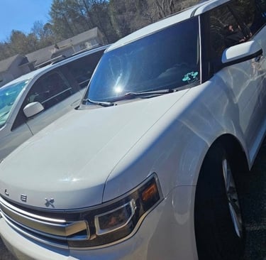 White Ford Flex unlocked by locksmith in Burnsville NC without door damage