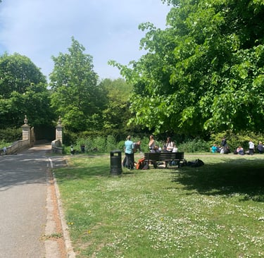Visitors to the River Wey enjoying lunch by the river in Church Lane Upwey May 2026