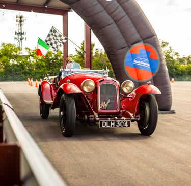 A classic Alfa Romeo driving.