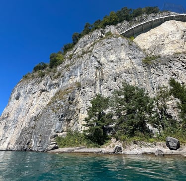 The steep cliffs just outside Sundlauenen are a popular with climbers