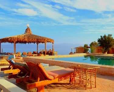 bedouin star swimming pool in front of the sea