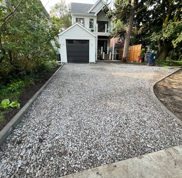 stone curb and gravel driveway