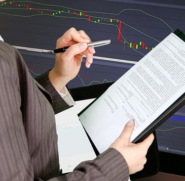 "A consultant analyzing Policy statement on an ipad during a business strategy meeting."