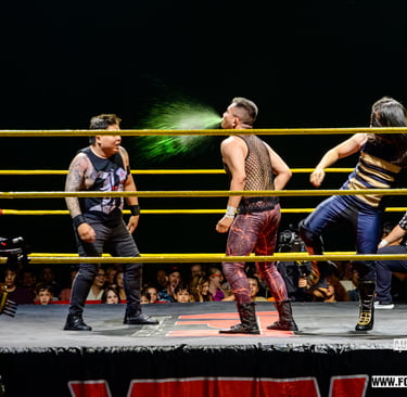 Khoa Truong spits mist at partner Henry VPW Spring Bash 2026