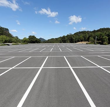 Parking lot striping machine