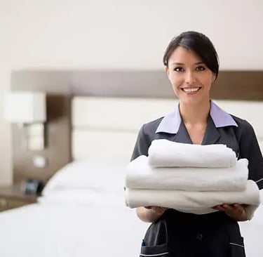 Femme de ménage dans un hotel