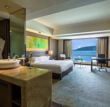 King bed with sea view room at Hyatt Regency Kinabalu